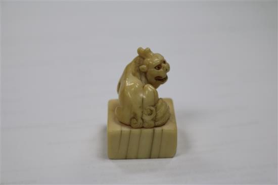 A 19th century Chinese ivory seal and a canton ivory boxed puzzle